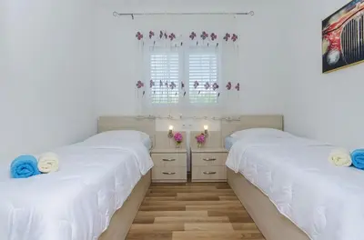 Krevet ili kreveti u jedinici u objektu Family friendly apartments with a swimming pool Split - 14203