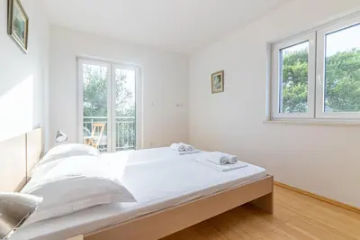 Krevet ili kreveti u jedinici u objektu Family-friendly apartments with swimming pool Sutivan, Brac - 15665