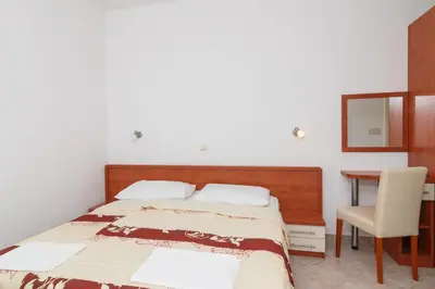 Krevet ili kreveti u jedinici u objektu Apartments & Rooms Konoba Tomić
