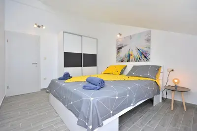 Krevet ili kreveti u jedinici u objektu Sea View Luxury Apartments, ALA DA