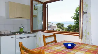 Kuhinja ili čajna kuhinja u objektu Beach front apartments Balica Rat