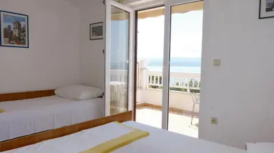 Krevet ili kreveti u jedinici u objektu Beach front apartments Balica Rat