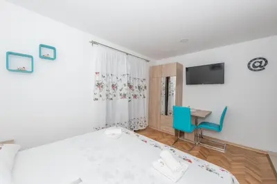 TV i/ili zabavni centar u objektu Apartments Royal M&M