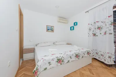 Krevet ili kreveti u jedinici u objektu Apartments Royal M&M