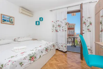 Krevet ili kreveti u jedinici u objektu Apartments Royal M&M