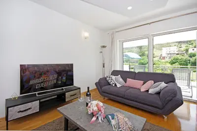TV i/ili zabavni centar u objektu Luxurious, modern and spacious apartment with terraces