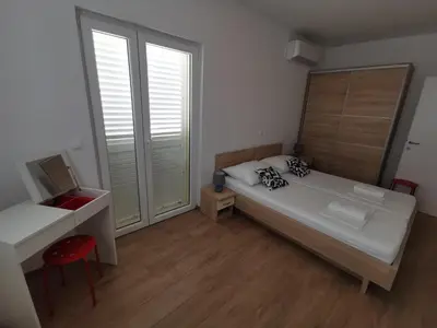 Krevet ili kreveti u jedinici u objektu Apartmani Kronjac