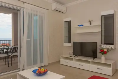 TV i/ili zabavni centar u objektu Apartmani Stella Maris