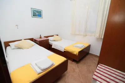 Krevet ili kreveti u jedinici u objektu Apartments by the sea Cove Vela Stiniva, Hvar - 13935