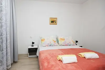 Krevet ili kreveti u jedinici u objektu Apartmani Lovre
