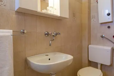Kupaonica u objektu Rooms Marinac