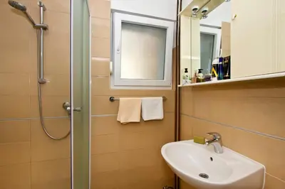 Kupaonica u objektu Apartment Topic near the beach