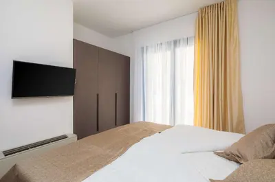 Krevet ili kreveti u jedinici u objektu Villa Four Brothers - Exclusive Apartment