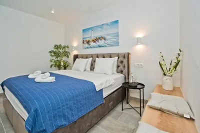 Krevet ili kreveti u jedinici u objektu Apartment and Studios Happy Place