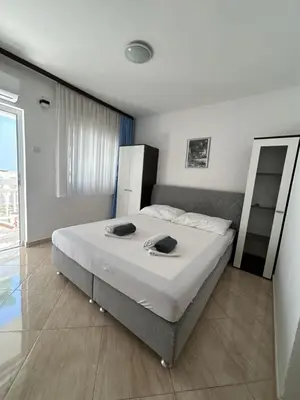 Krevet ili kreveti u jedinici u objektu Apartmani Jukanovic