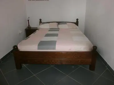 Krevet ili kreveti u jedinici u objektu APARTMANI LAŠTRO