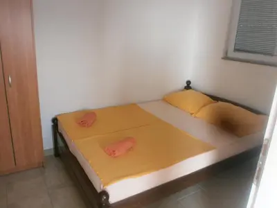 Krevet ili kreveti u jedinici u objektu APARTMANI LAŠTRO