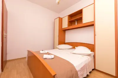Krevet ili kreveti u jedinici u objektu Apartments A cappella music