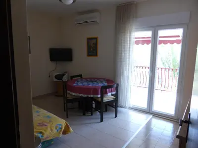 TV i/ili zabavni centar u objektu Ferienwohnung Dalmatien