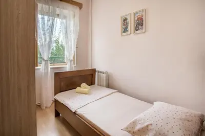 Krevet ili kreveti u jedinici u objektu Holiday Village Home Kamenica