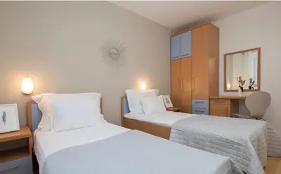 Krevet ili kreveti u jedinici u objektu Lavica Seaside Apartments, Podstrana