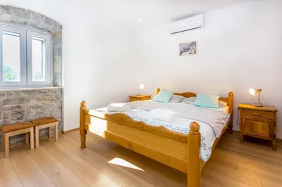 Krevet ili kreveti u jedinici u objektu Apartmani Rebac