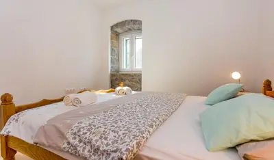 Krevet ili kreveti u jedinici u objektu Apartmani Rebac