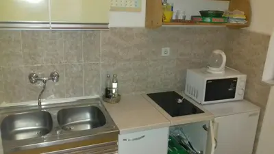 Kuhinja ili čajna kuhinja u objektu Apartments Ada Novak