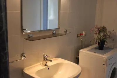 Kupaonica u objektu Oasis Apartments