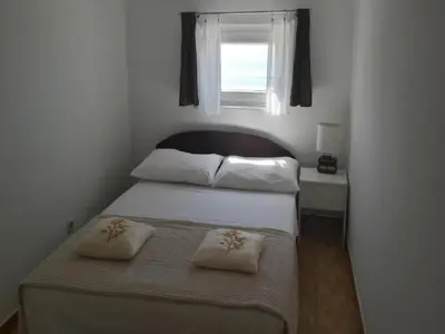Krevet ili kreveti u jedinici u objektu Apartments Bandalo