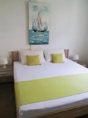 Krevet ili kreveti u jedinici u objektu Nemira beach apartments