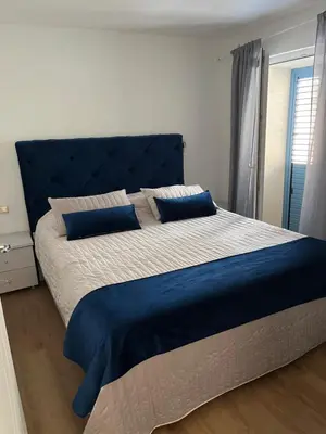 Krevet ili kreveti u jedinici u objektu Villa de Blue-Rooftop pool & Jacuzzi