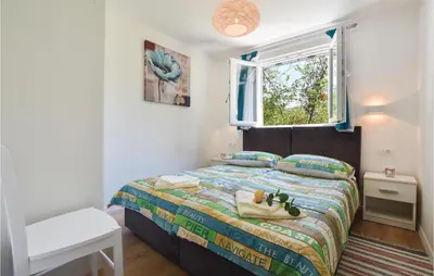 Krevet ili kreveti u jedinici u objektu Two-Bedroom Holiday Home In Blato Na Cetini