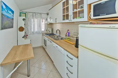 Kuhinja ili čajna kuhinja u objektu Apartments Jure