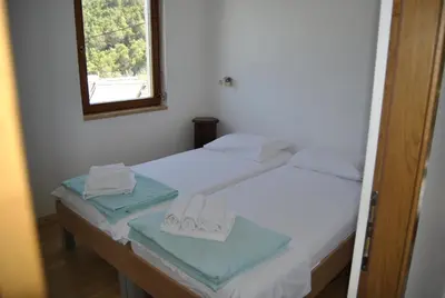 Krevet ili kreveti u jedinici u objektu Holiday house with a swimming pool Stomorska, Solta - 15950