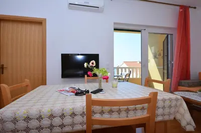 TV i/ili zabavni centar u objektu Apartments Punta Milna