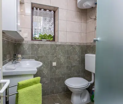 Kupaonica u objektu Apartmani LuNa