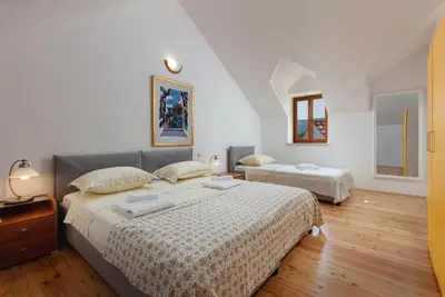 Krevet ili kreveti u jedinici u objektu Villa Dubrava - Heated Pool & Olive Grove Retreat I Brač Island