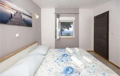 Krevet ili kreveti u jedinici u objektu One-Bedroom Apartment In Suhi Potok-Jesenice