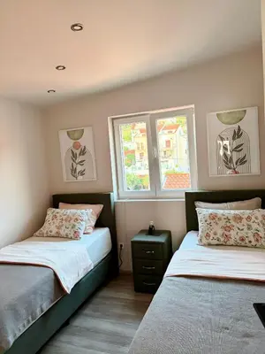 Krevet ili kreveti u jedinici u objektu Apartmani Mutogras