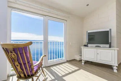TV i/ili zabavni centar u objektu Apartments Luxury view