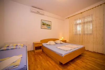 Krevet ili kreveti u jedinici u objektu Apartments Saga