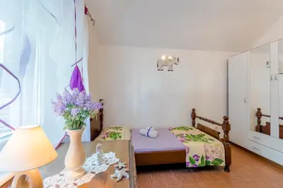 Krevet ili kreveti u jedinici u objektu Vila Maslinica