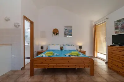 Krevet ili kreveti u jedinici u objektu Apartments Mira