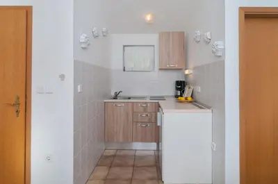 Kuhinja ili čajna kuhinja u objektu Apartments Mira