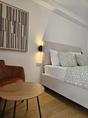 Krevet ili kreveti u jedinici u objektu Lendas Apartments & Rooms