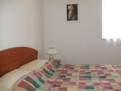 Krevet ili kreveti u jedinici u objektu Apartment in Bol with sea view, balcony, air conditioning, Wi-Fi (652-1)