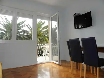TV i/ili zabavni centar u objektu Apartment in Duce with sea view, terrace, air conditioning, Wi-Fi (4166-2)