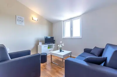 TV i/ili zabavni centar u objektu Apartments Listes