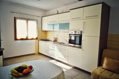 Kuhinja ili čajna kuhinja u objektu Apartments by the sea Povlja, Brac - 14399